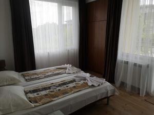Postel nebo postele na pokoji v ubytování Miraj-MD