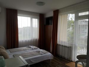 Postel nebo postele na pokoji v ubytování Miraj-MD