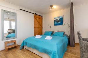 En eller flere senge i et værelse på Welcome in - Studio - Zuidstraat 113, Westkapelle