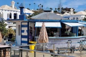 Reštaurácia alebo iné gastronomické zariadenie v ubytovaní Dúplex Maspalomas