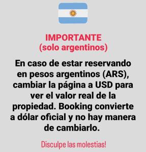 Captura de pantalla de un mensaje de texto sobre la bandera argentina en Departamento con patio en excelente ubicación en Belgrano en Buenos Aires