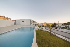 a view of a swimming pool in a house at Lagoa Views - Holiday Apartment by SCH in Foz do Arelho