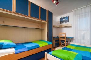 Postel nebo postele na pokoji v ubytování Apartment Definis