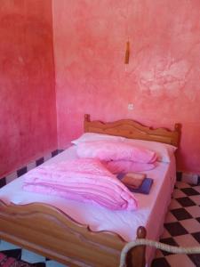 Llit o llits en una habitació de Complexe Collier D' Ambre