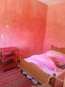 Llit o llits en una habitació de Complexe Collier D' Ambre