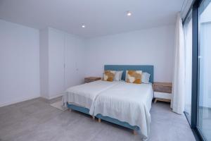 Posteľ alebo postele v izbe v ubytovaní Villa Yolo Sur Private Pool Corralejo By Holidays Home