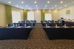 a conference room with chairs and tables in it at Staybridge Suites San Luis Potosi by IHG in San Luis Potosí +89 photos