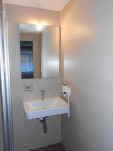 Kúpeľňa v ubytovaní Appartement beim Brunnen 10