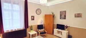 TV a/nebo společenská místnost v ubytování Center Apartman Szeged