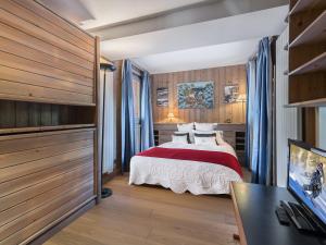 Ein Bett oder Betten in einem Zimmer der Unterkunft Appartement Val-d'Isère, 4 pièces, 9 personnes - FR-1-567-33