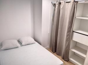 Posteľ alebo postele v izbe v ubytovaní Résidence Le Roseland