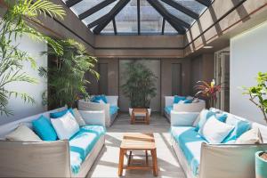 Le Barthélemy Hotel & Spa的休息区