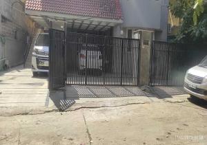 a gate with a no parking sign in front of a house at Best Individual Home stay Near Apollo Jubilee Hills in Hyderabad