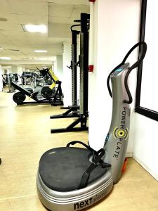 a gym with a hair dryer in a room at Anmaria Beach Hotel & Spa in Ayia Napa