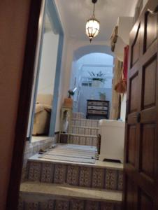 a view from the hallway of a house with a staircase at La casa de loto in Alcalá de los Gazules