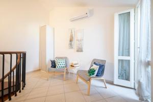 Χώρος καθιστικού στο Trilocale a due passi dal centro e dal mare