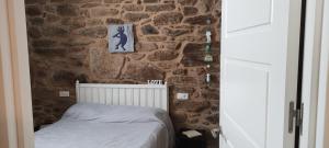 Posteľ alebo postele v izbe v ubytovaní Casa de Canteiro Louro - Muros