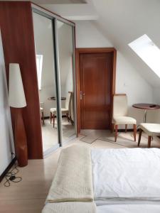 Łóżko lub łóżka w pokoju w obiekcie Pensjon Paradise