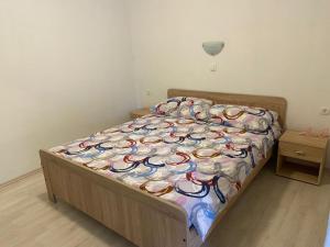 Postel nebo postele na pokoji v ubytování Apartman Nina