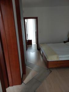 Łóżko lub łóżka w pokoju w obiekcie Pensjon Paradise