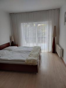 Łóżko lub łóżka w pokoju w obiekcie Pensjon Paradise