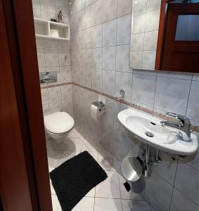 Koupelna v ubytování Apartament Sanna