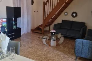 Część wypoczynkowa w obiekcie Maison de ville avec garage