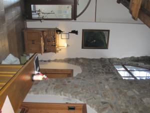 a bedroom with a large bed in a room at Schloss Schänke garni in Bautzen