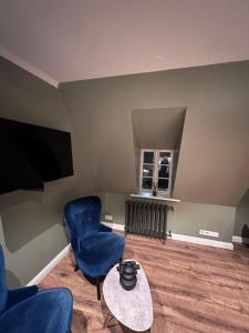 TV a/nebo společenská místnost v ubytování Heart House Guesthouse