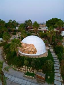 an overhead view of a domed building in a park at Glamping -420 in Kalia