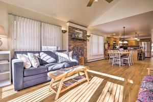 a living room with a couch and a table at Westerly Vacation Home: Town Beach Access in Westerly