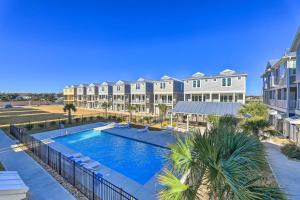 an image of a swimming pool at a resort at Gorgeous Emerald Isle Getaway Walk to Beach! in Emerald Isle