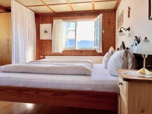 Postel nebo postele na pokoji v ubytování Bio Ferienbauernhof Greber + 37 fotografií
