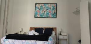 Posteľ alebo postele v izbe v ubytovaní Malaguetor Home Colón