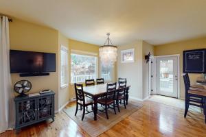 a dining room with a table and chairs at Bay View Retreat in Eastsound