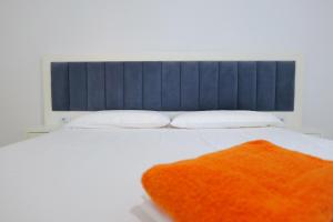 Postel nebo postele na pokoji v ubytování Davide Rooms