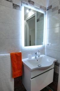 Koupelna v ubytování Davide Rooms