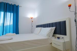 Postel nebo postele na pokoji v ubytování Davide Rooms