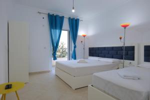 Postel nebo postele na pokoji v ubytování Davide Rooms