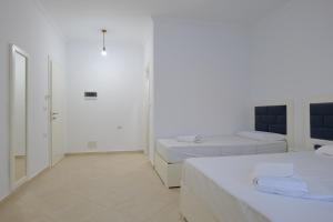 Postel nebo postele na pokoji v ubytování Davide Rooms