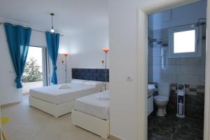 Koupelna v ubytování Davide Rooms