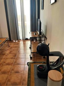 Posilňovňa alebo fitness centrum v ubytovaní APARTAMENTOS CASERIA DE COMARES
