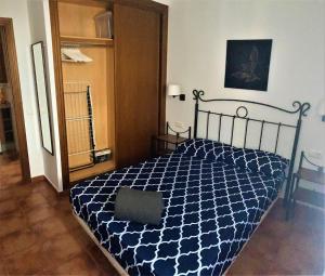 Posteľ alebo postele v izbe v ubytovaní APARTAMENTOS CASERIA DE COMARES