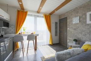 TV a/nebo společenská místnost v ubytování Lotti Residence Harmony