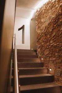 a staircase in a building with the number one on the wall at Mamma Mia Hotel Boutique - Only Adults in Tossa de Mar
