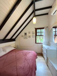 Кровать или кровати в номере Triplex aconchegante