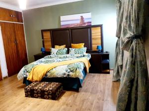 Postel nebo postele na pokoji v ubytování Horison Meyer Guest Suites
