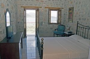 TV a/nebo společenská místnost v ubytování Smyros Resort