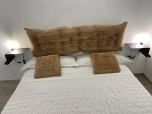Postel nebo postele na pokoji v ubytování GREandCO PARKING PUBLICO GRATUITO