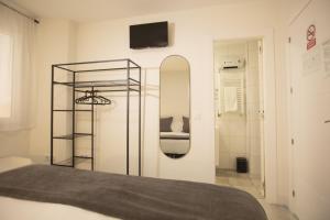 Cama ou camas em um quarto em Alojamientos Cantíber